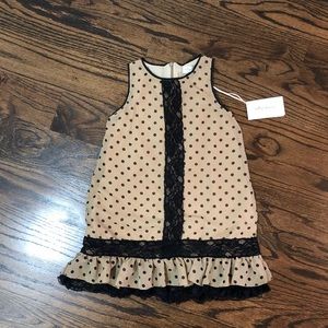 Girl’s Polk a dot dress with lace detail